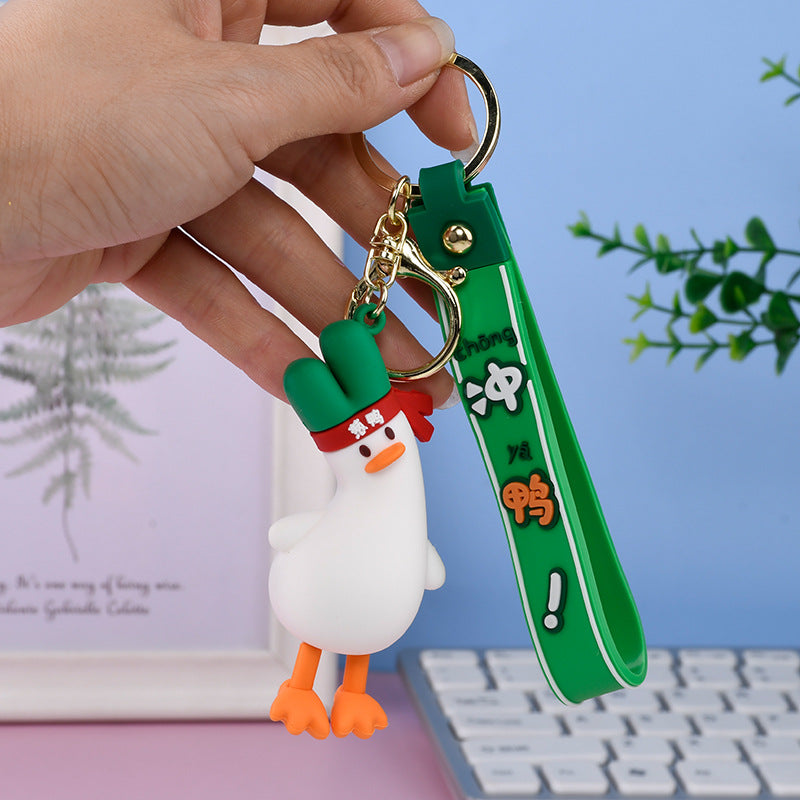 Wholesale PVC Tilted Head Little Yellow Duck Doll Keychain